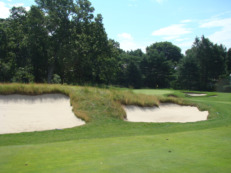 Hanse masterfully massaged the land to feed into these fairway bunkers.